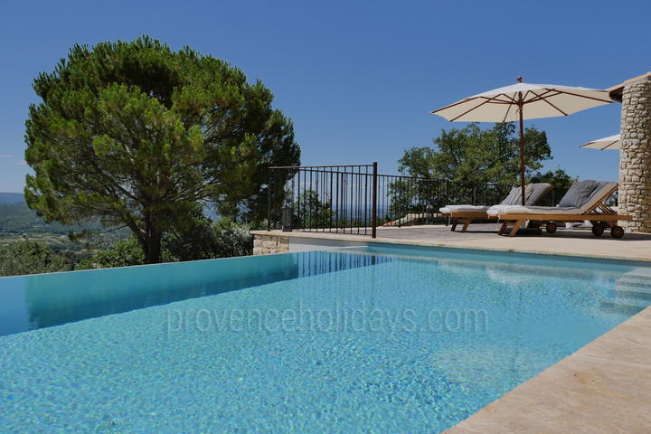 Maison de vacances avec vue panoramique et piscine à débordement
